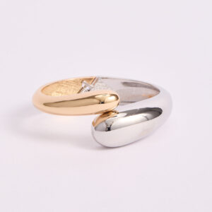 Brazalete rígido bicolor con acabado espejo premium Nefrah